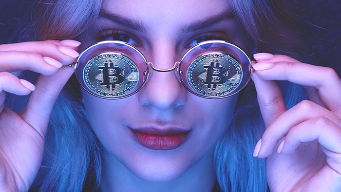 How to Buy Cryptocurrency - Woman with Bitcoin Glasses