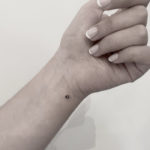 Small Wrist Tattoos - tiny paw print