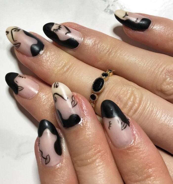 Black Nails - Negative Spacing Faces Nail Designs