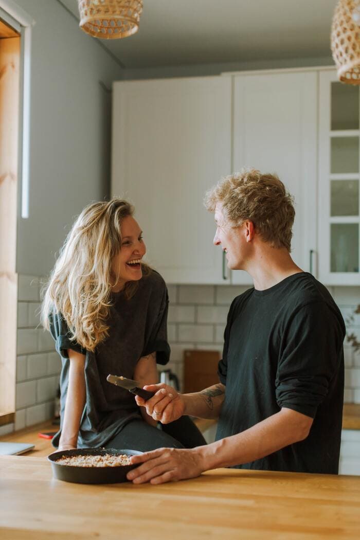 April Fools Pranks - laughing couple in kitchen